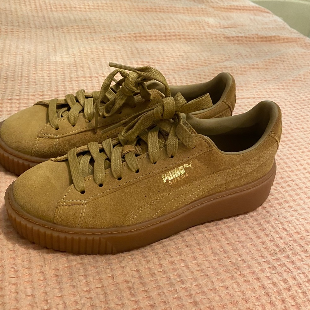 Brown suede Puma sneakers